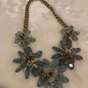 Beautiful light blue necklace.